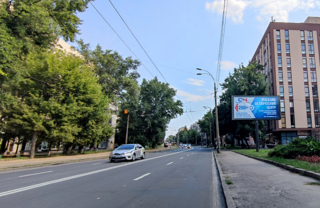 Скролл 6x3,  Кирилівська (Фрунзе), 123 в напрямку руху до центру міста 