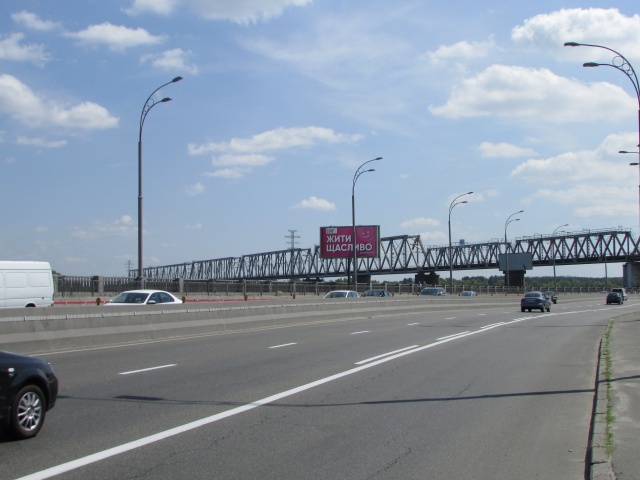Бэклайт 6x3, Набережно-Рибальська дорога, (200 метрів до Петрівського мосту) рух в напрямку центру міста, ліворуч Бэклайт 6x3, Набережно-Рибальська дорога, (200 метрів до Петрівського мосту) рух в напрямку центру міста, ліворуч